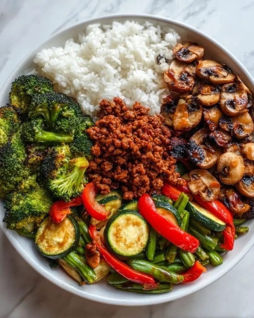 Spicy Ground Beef Stir-Fry Bowl with Garlic Veggies & Steamy Rice Recipe
