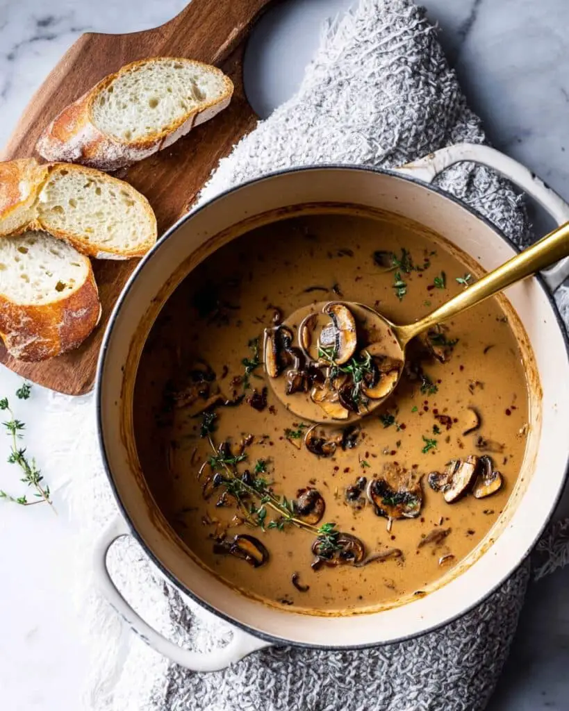Creamy Mushroom Soup with Rosemary, Garlic Chips, and Truffle Oil Recipe