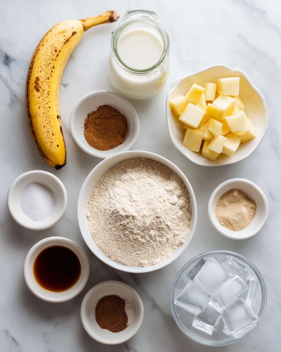 The image shows a white marbled surface with several small white bowls and a jar arranged neatly. At the center, there is a white bowl filled with light beige flour. Above it to the right, a white bowl contains yellow cubed pieces of apple. To the left is a small white bowl with a cinnamon-colored powder. A glass jar filled with white milk is placed above the flour bowl. A peeled yellow banana is at the bottom left, near small white bowls holding light brown liquid, dark brown liquid, and white salt mixed with brown spice. On the right side, a white bowl contains clear ice cubes. Photo taken with an iphone --ar 4:5 --v 7