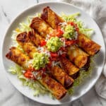 Crispy Homemade Beef Taquitos with Toppings Recipe